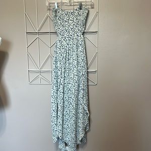 Tube like top, cut out at waist, mini under, high low outer